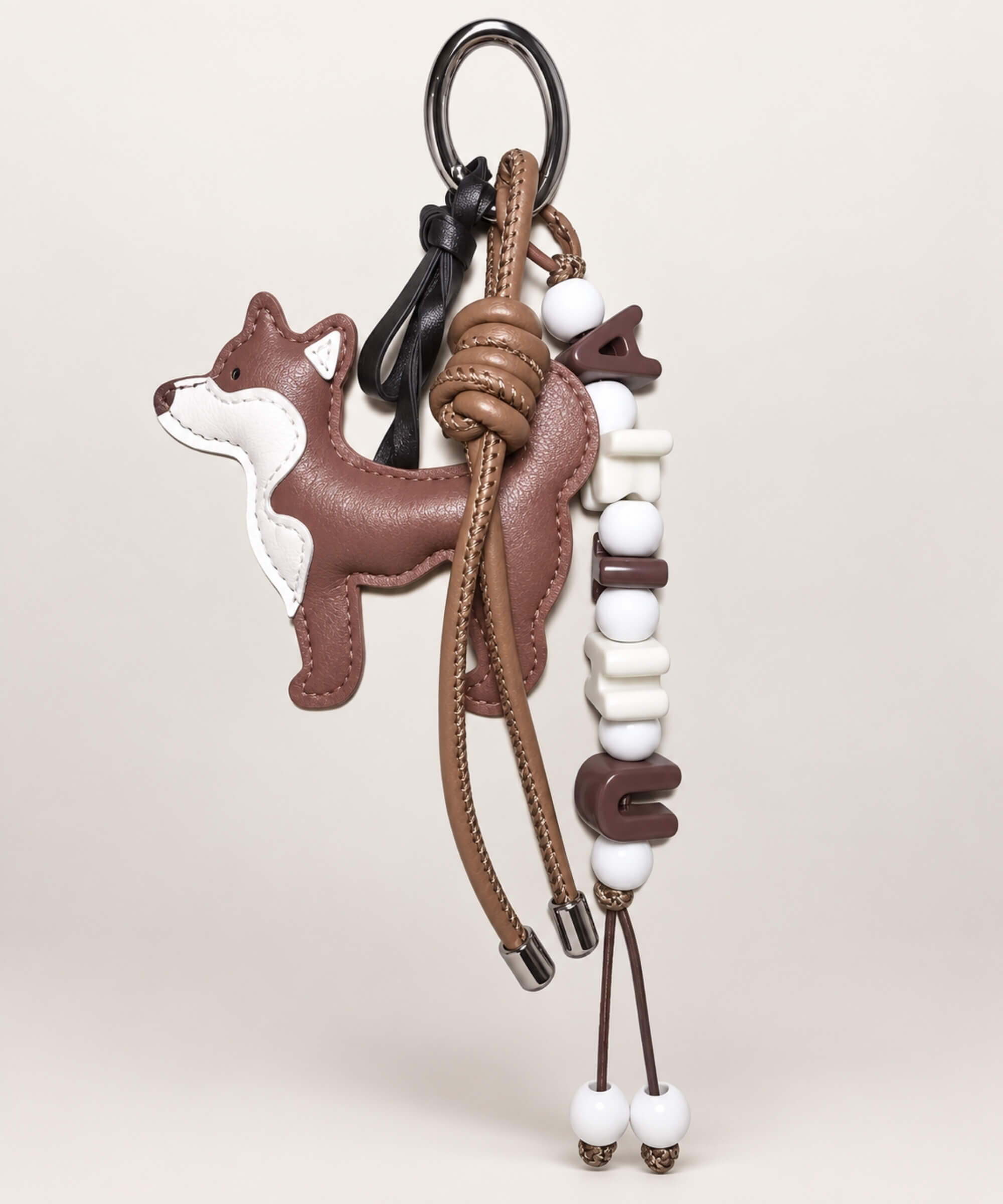 Brown Shiba Inu PU leather bag charm keychain with decorative beads and cord details